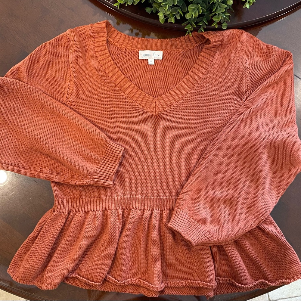 Grace & Lace mel's pretty peplum sweater in brick